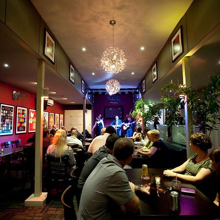 Ramada By Wyndham Hervey Bay Restaurant photo The interior of the restaurant